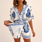 Azzurine™ Romper With Skirt Overlay And Side Tie